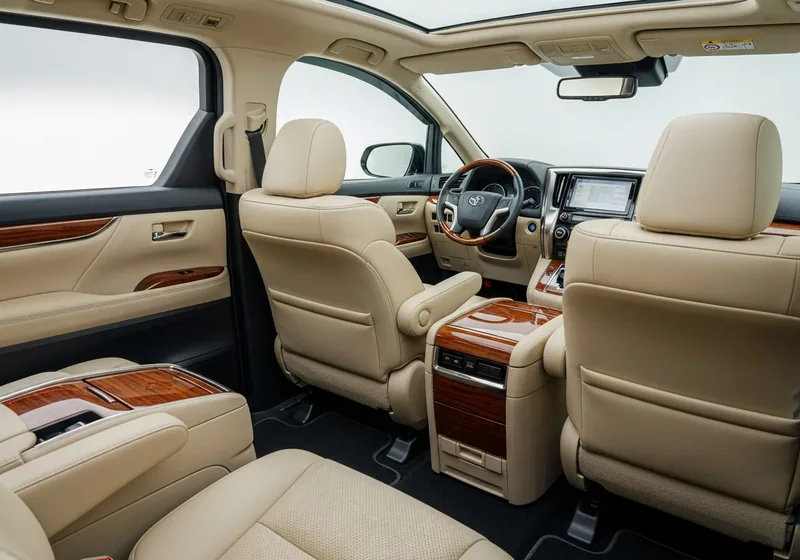 Toyota Alphard interior used for private Bali airport transfers — captain seats and air-conditioned cabin
